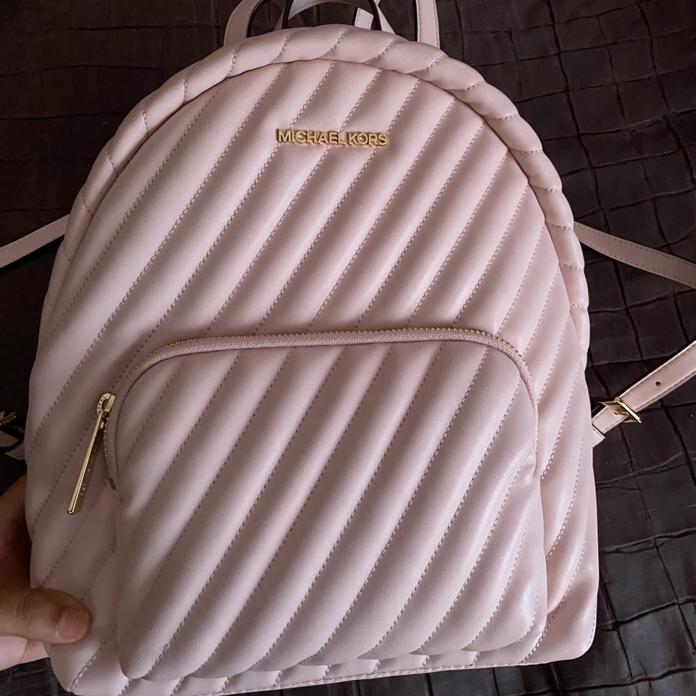 Michael Kors pink vegan faux leather backpack
